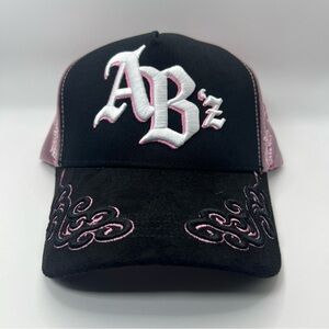 Shi by JOURNEYS Black Hat with Pink Embroidery